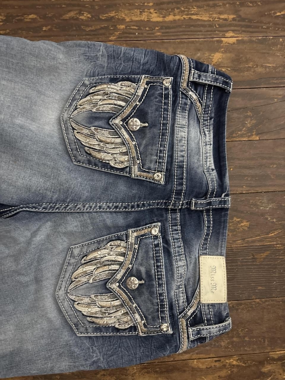 Miss Me Distressed Blue Bootcut Jeans with Embroidered Wing Pockets